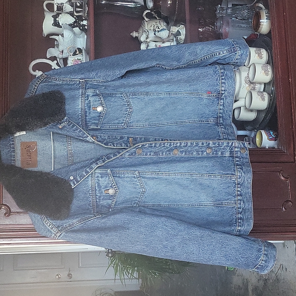 Ladies jacket...Chico's..size 2..denim